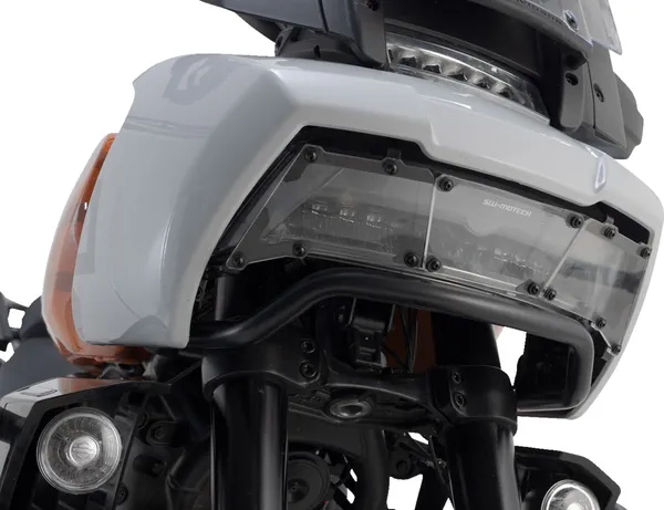 1341f6870b65ddb6e3170ffb07e48b47_600.webp HEADLIGHT GUARD